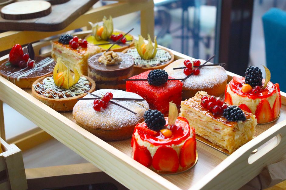 Hand-crafted artistic pastries arranged in a box