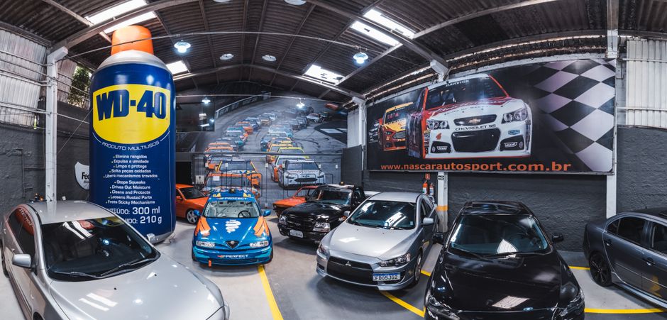 Car dealership digital advertising monitors and vehicles