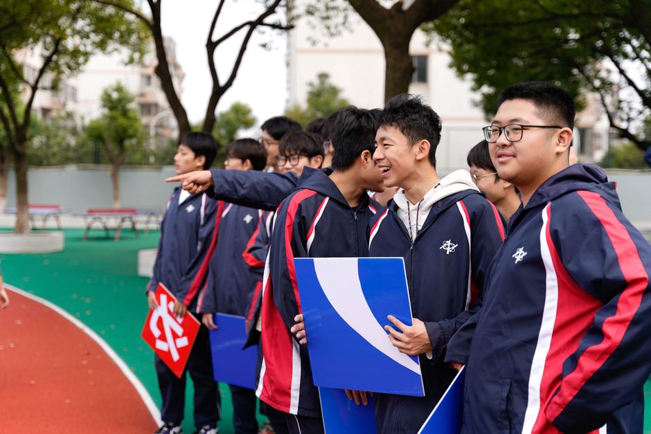 High school students involved in a collaborative activity at school