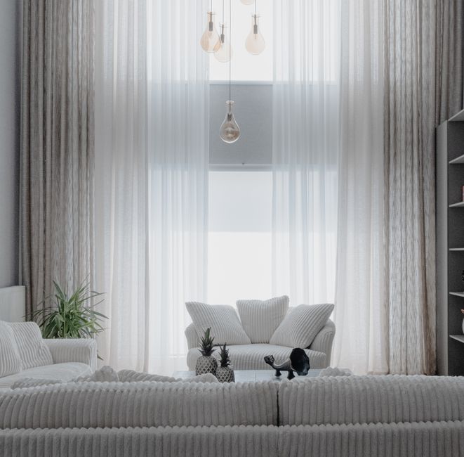 Modern sofas in a sunlit living room