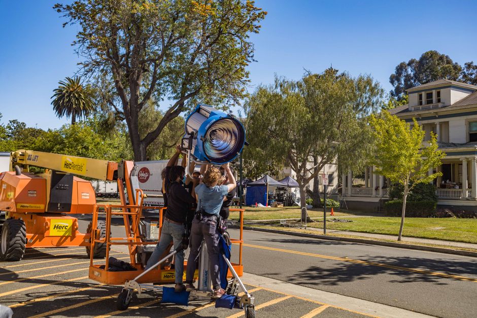 Lighting and grip equipment arranged on a film set