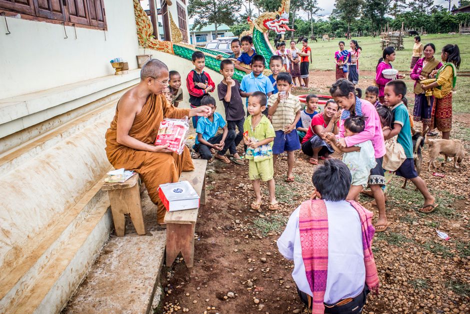 Ifa priest explaining teachings to temple attendees