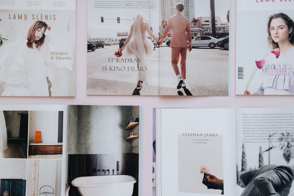 Open glossy lifestyle magazine with community stories