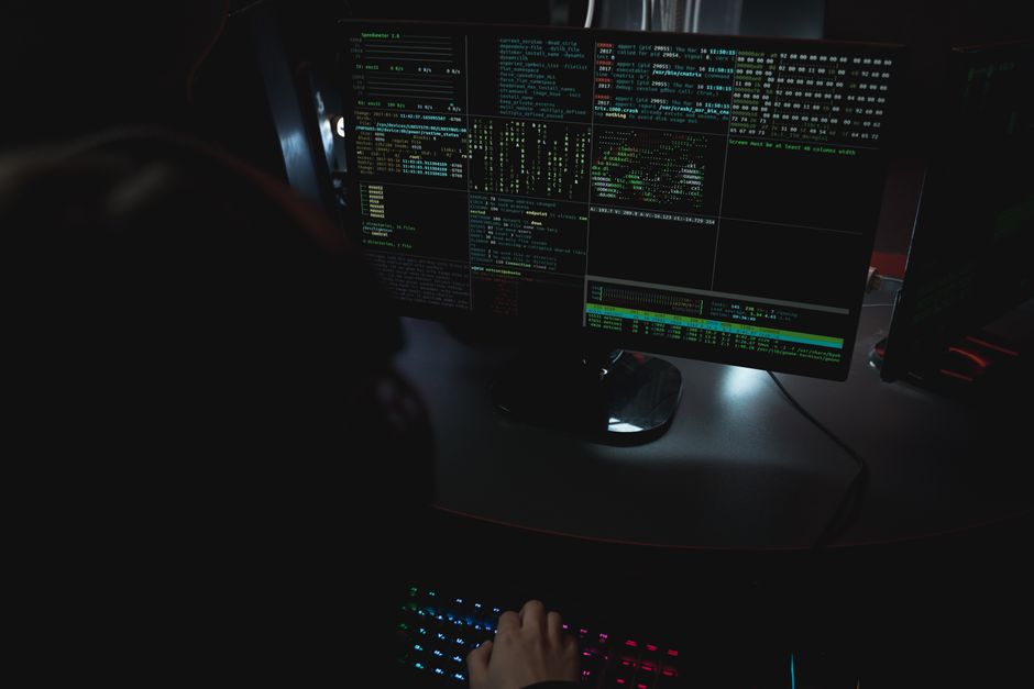 Cybersecurity team working at computer monitors