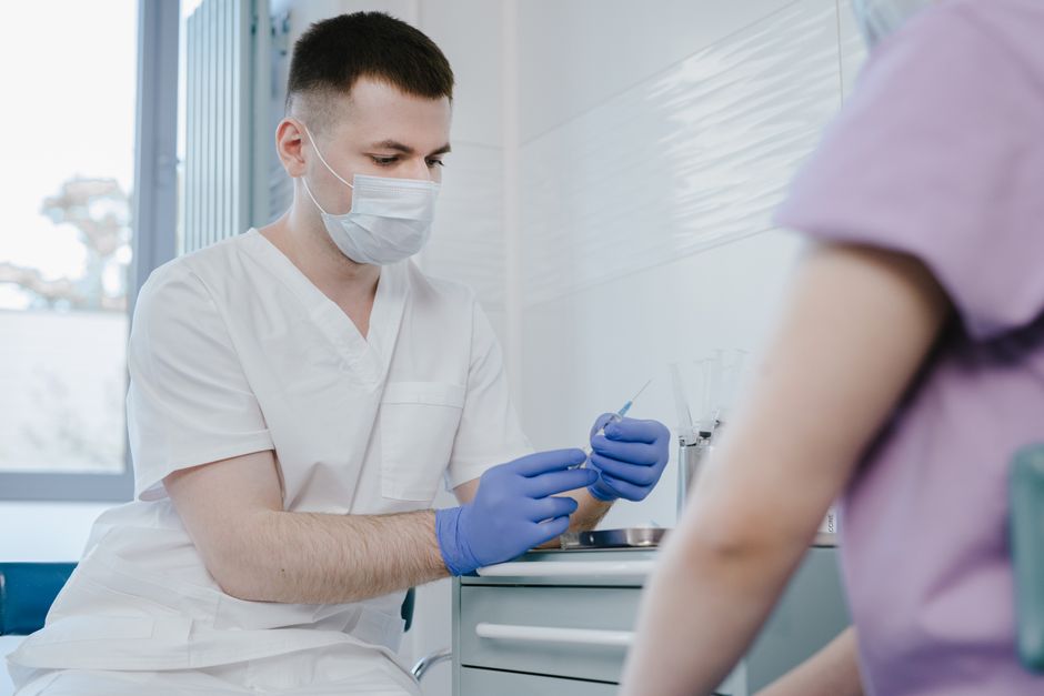 Pharmacist administering a vaccination