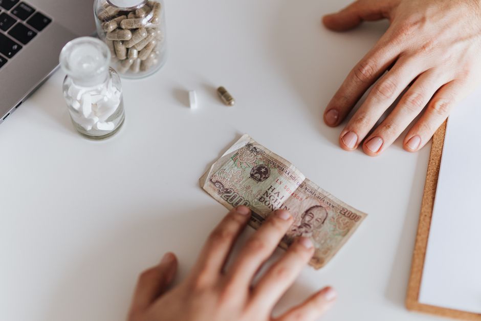 Healthcare team working with financial data – medical debt collection