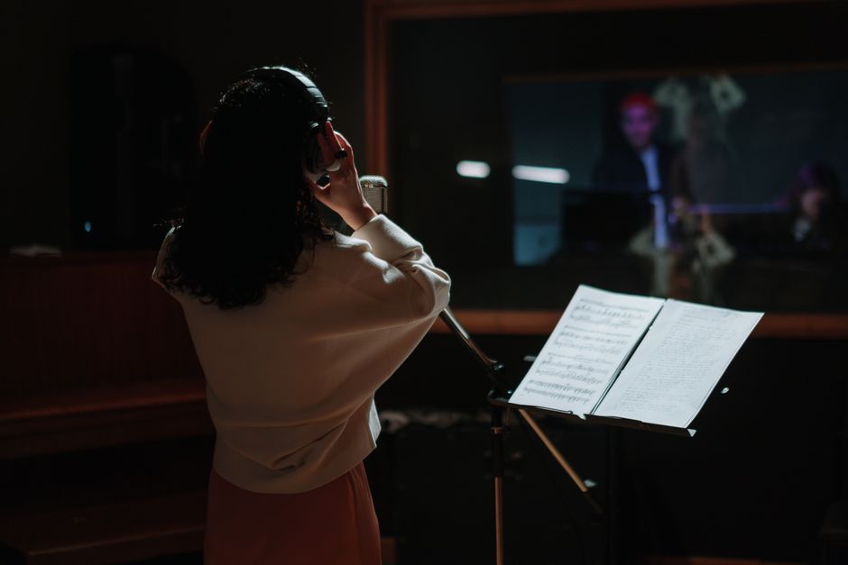 Producing a soundtrack album in a recording studio