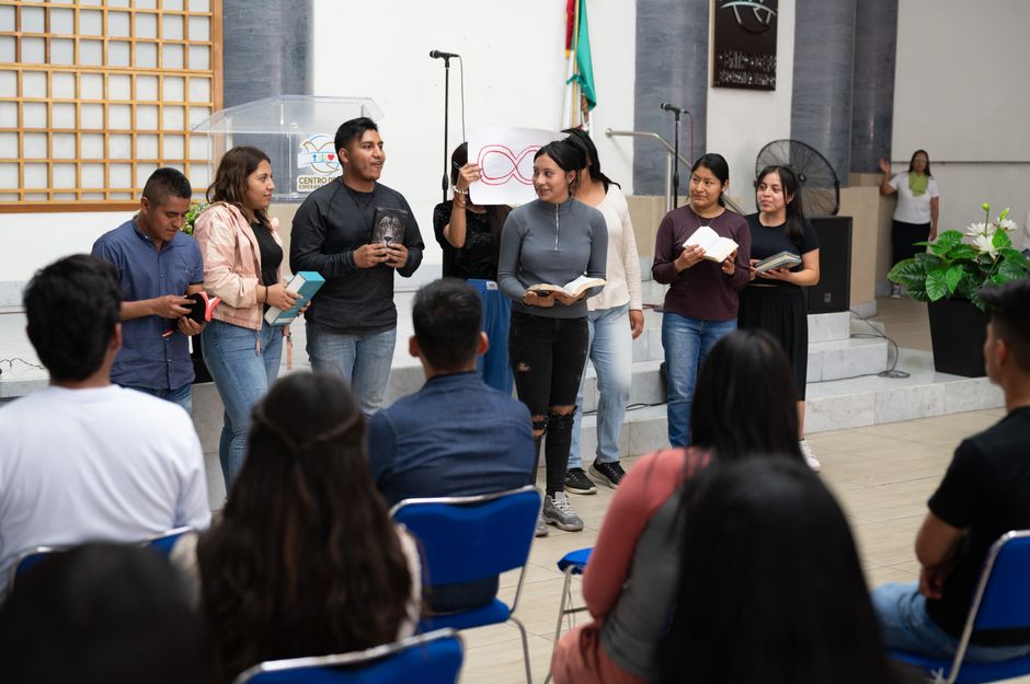 Immigrants attending a Christian education workshop.