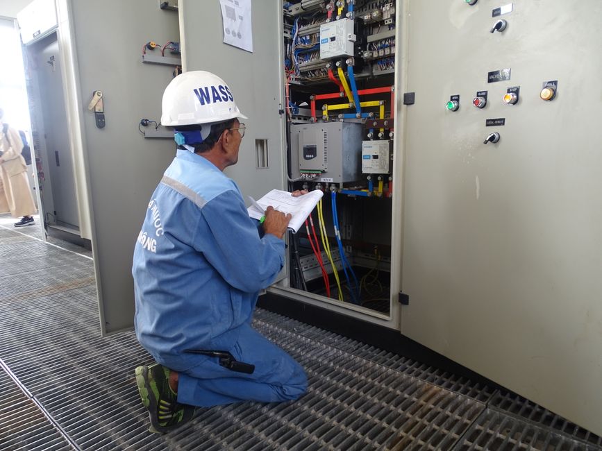 Life safety system being inspected by technicians