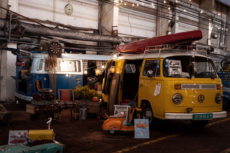 Vintage Volkswagen bus photo booth set up at an outdoor event