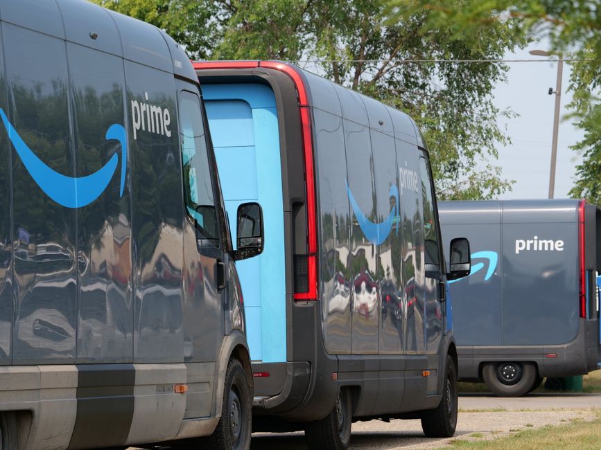 Vinyl-wrapped commercial van and company fleet