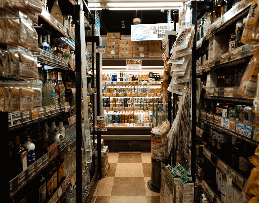 Convenience store interior with snack shelves and beverages