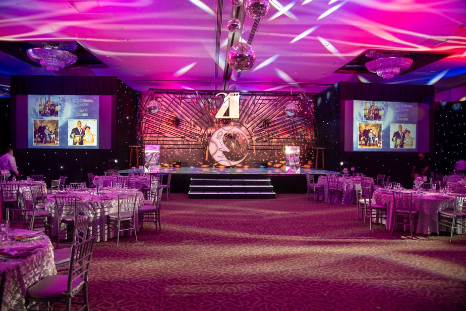 Gala dinner with corporate event design and stage lighting