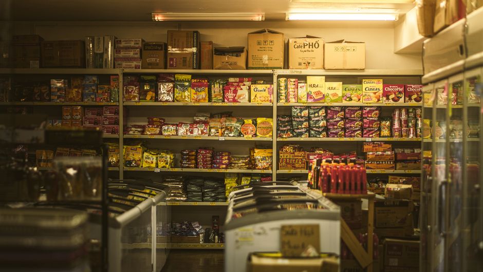 Convenience store shelves stocked with snacks