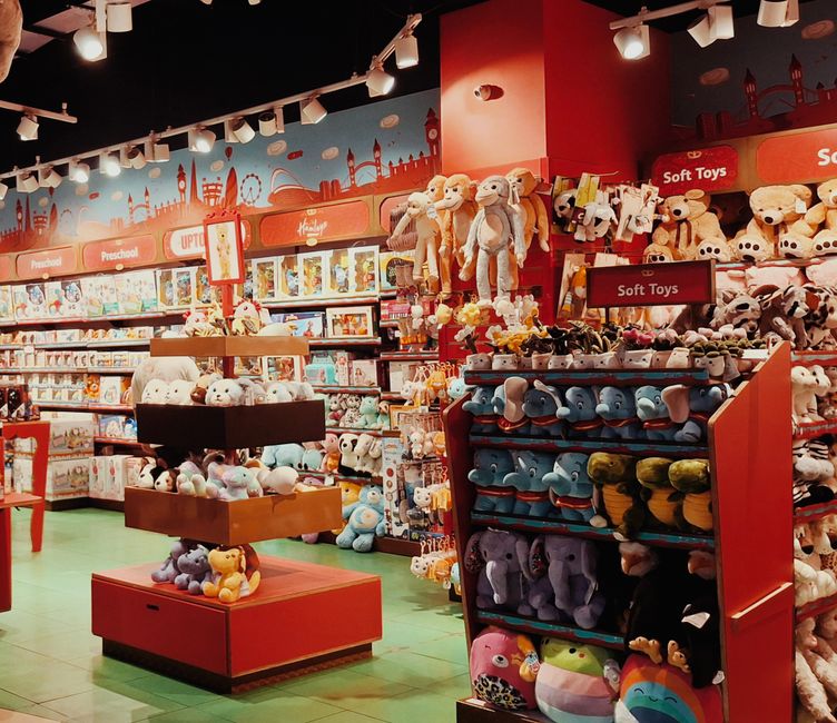 Family shopping for apparel and toys in a mountain store