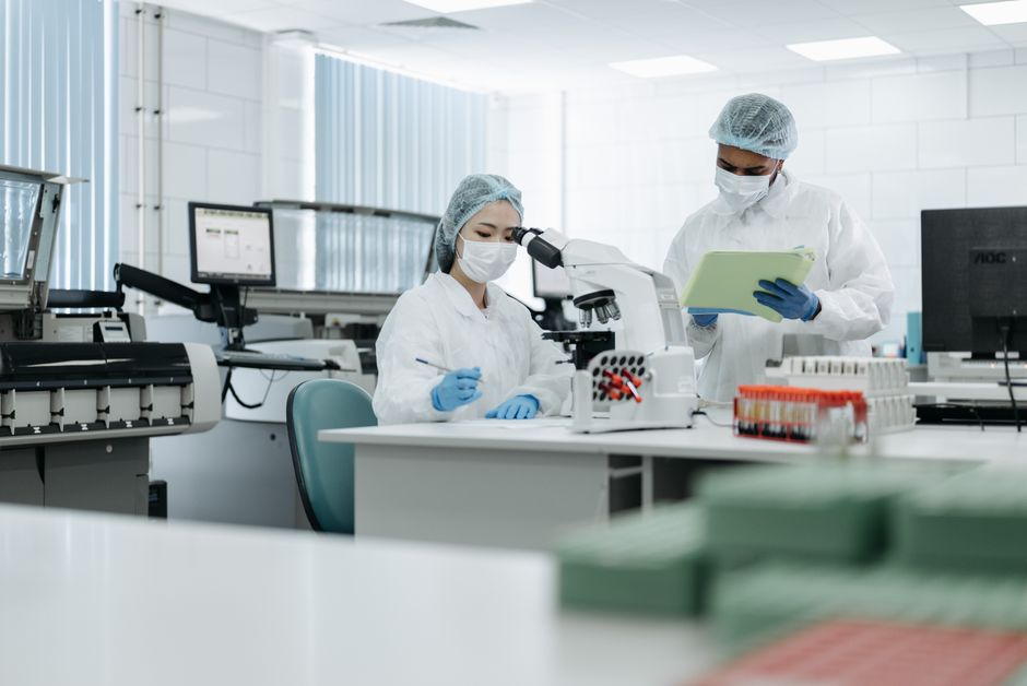 Researcher working on microbiome samples in a laboratory environment