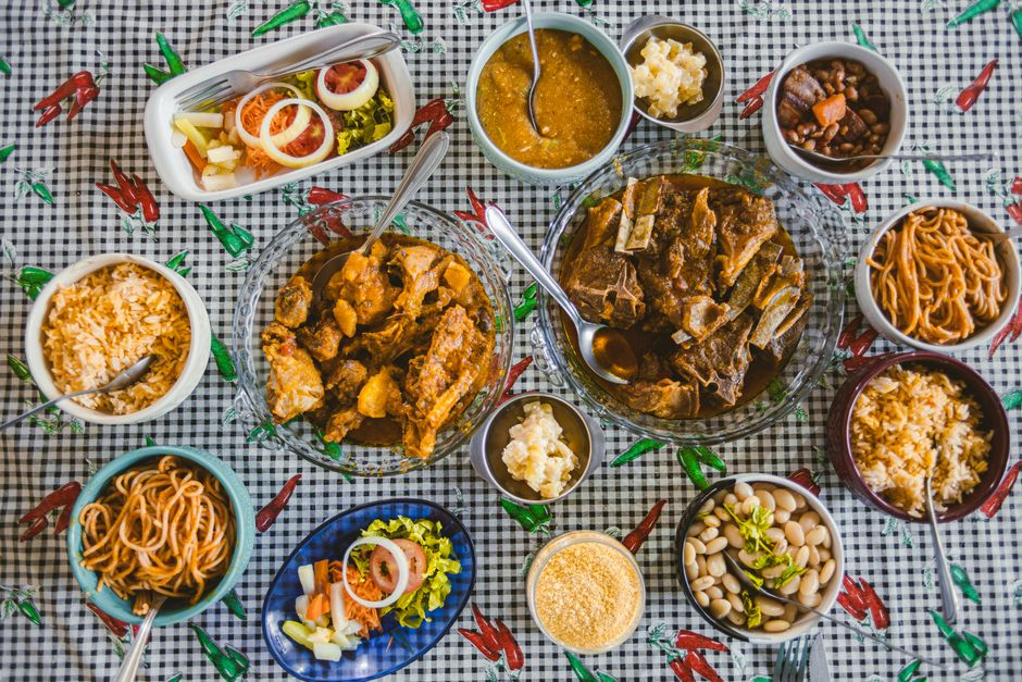 Traditional Ghanaian waakye rice and beans served with sides