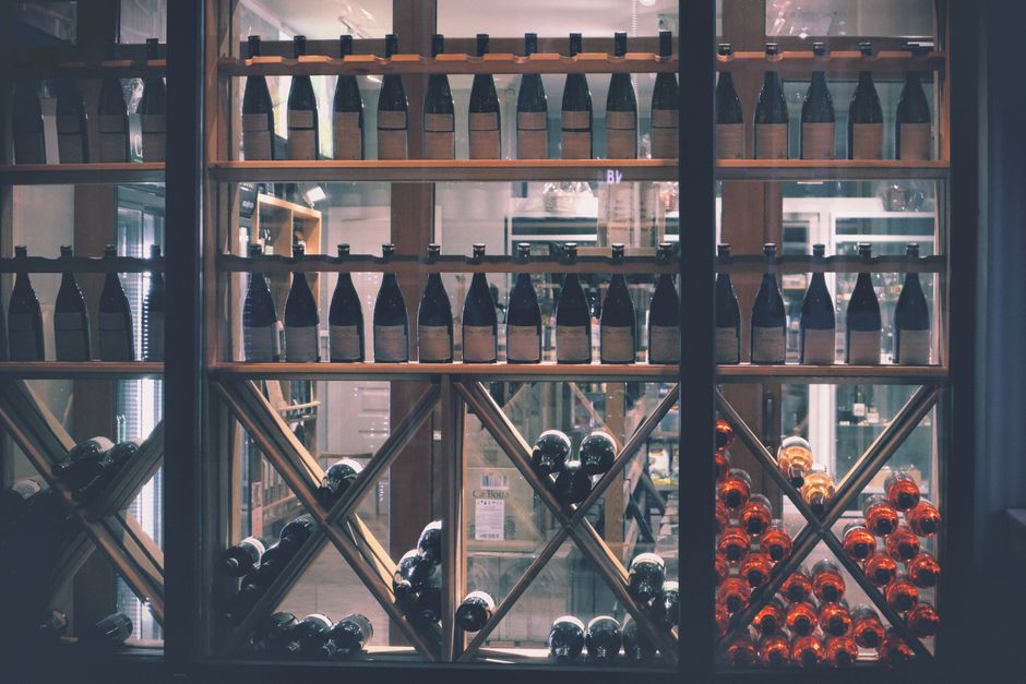 Wine marketing strategy session with luxury wine bottles