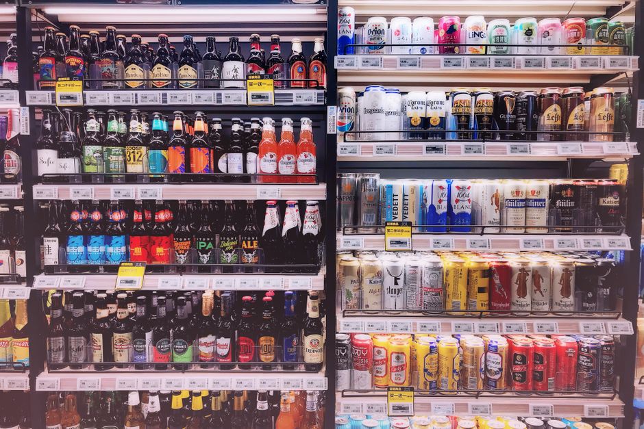Beer selection in a refrigerated store section