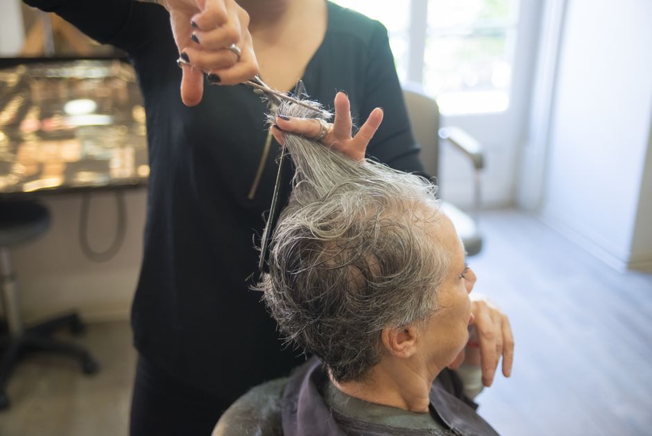 Elegant women's haircut by professional stylist