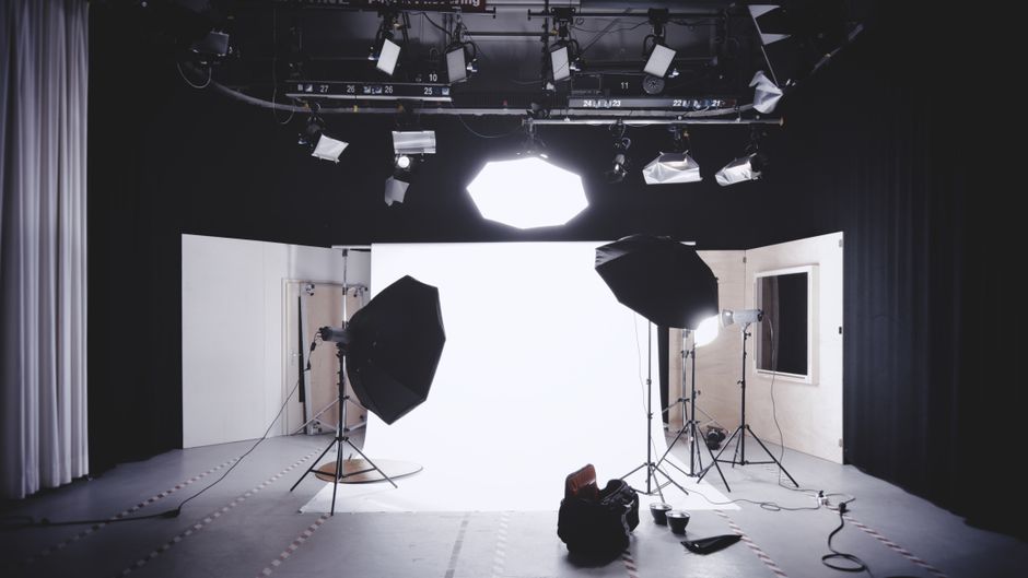 Commercial video production with professional camera equipment and lighting