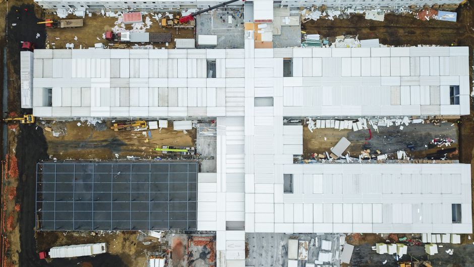 Workers on a commercial building construction site