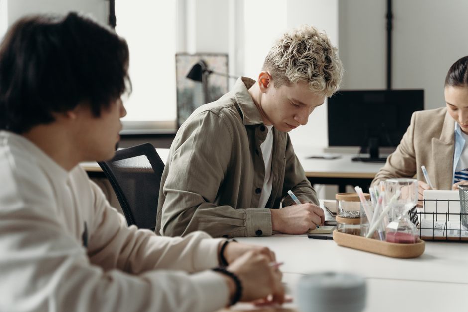 A high school student gaining work experience during a business internship
