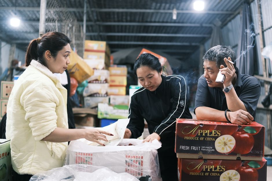 A professional team collaborating on produce trading operations