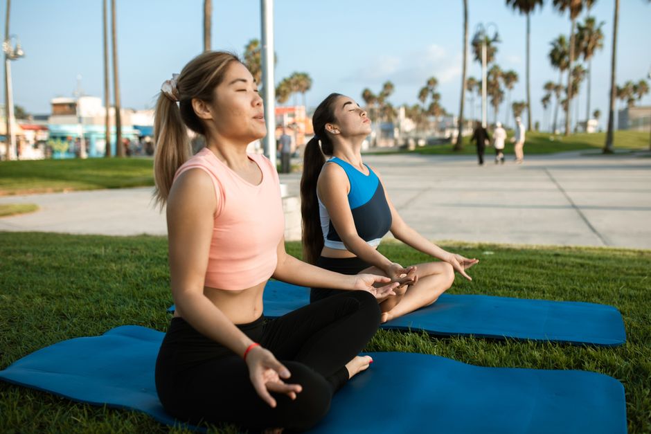 Participants practicing yoga at a retreat in California