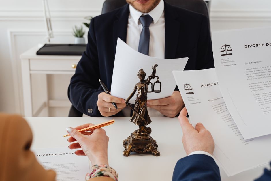 Attorney examining legal documents for consumer law compliance