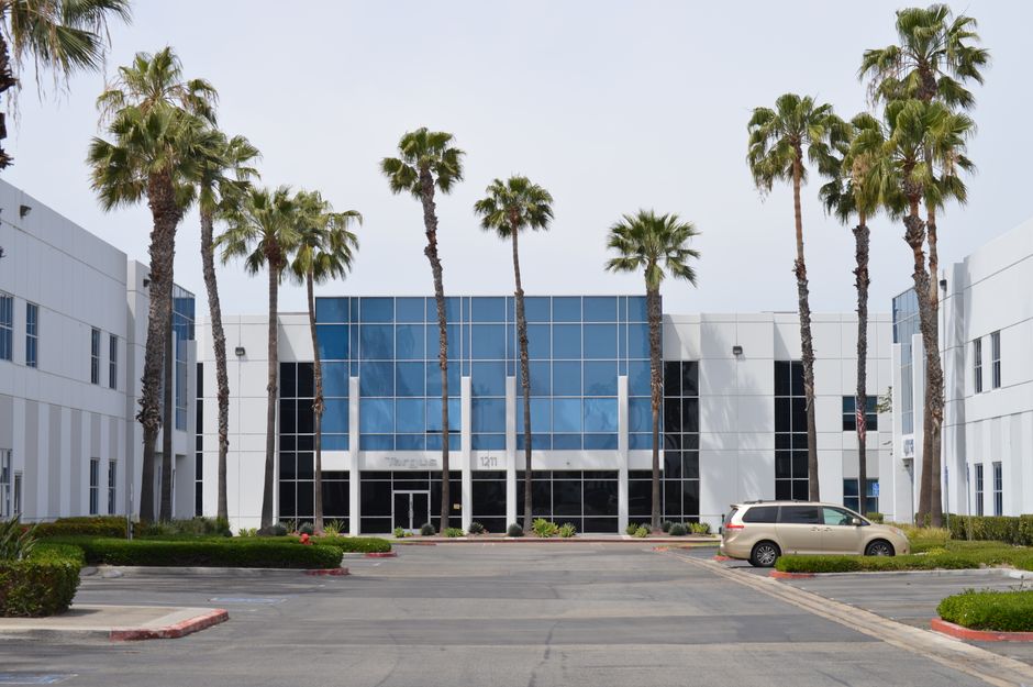 The exterior of a transportation and trucking company headquarters in Ontario, California