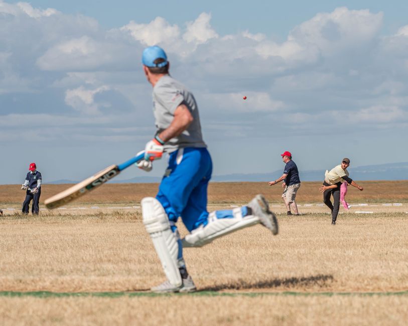 Local amateur cricket players during a community match
