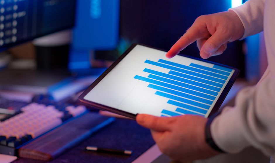 Fleet manager reviewing digital dashboard for vehicle monitoring