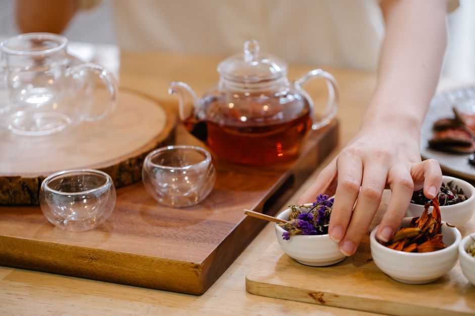 A selection of Asian herbal teas displayed in glass cups