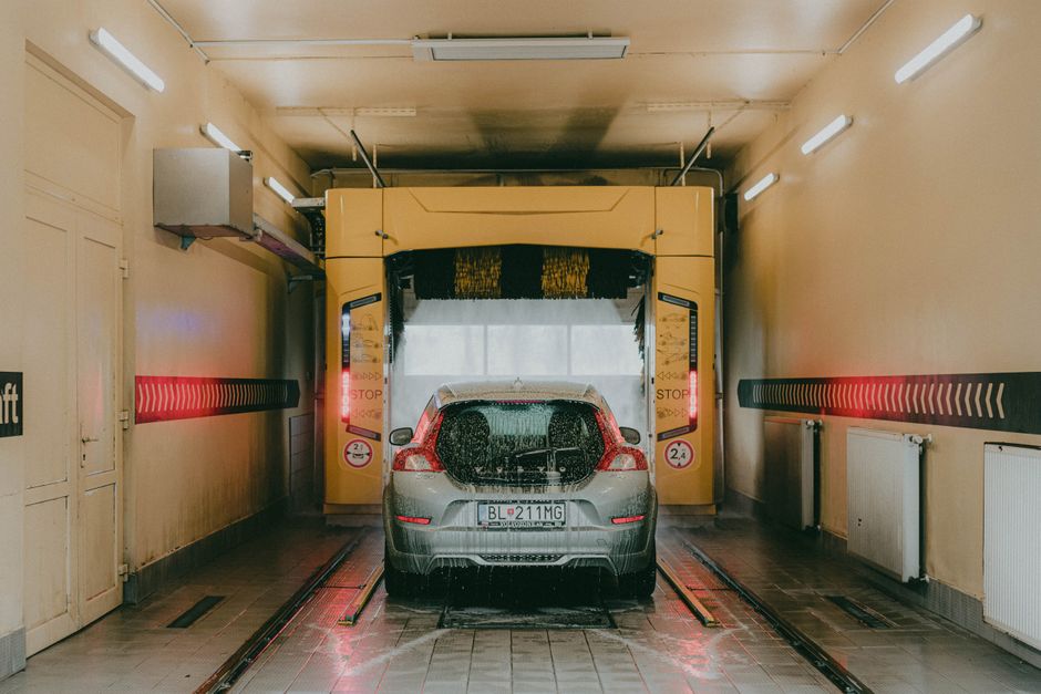 Modern car wash facility with clean open bays