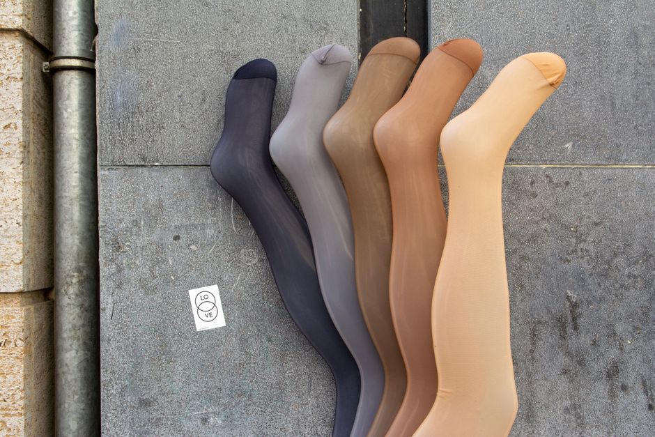 Stylish women's hosiery and essential accessories displayed collaboratively