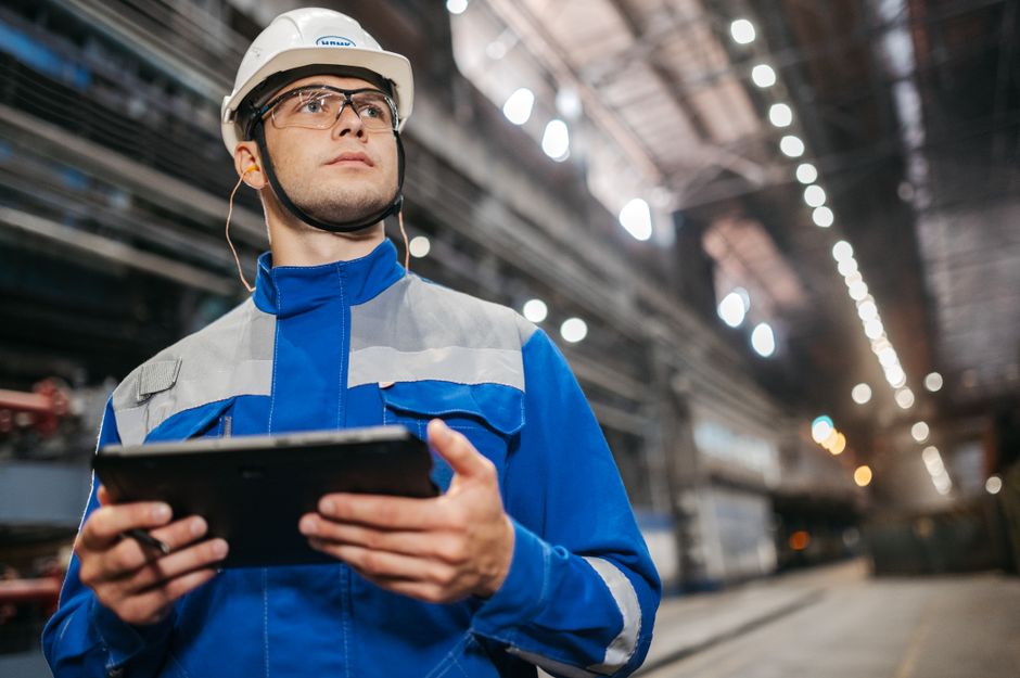 Inspector using digital tools for a facility safety audit
