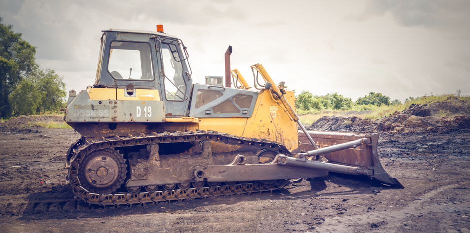 Soil decompaction equipment working on a field