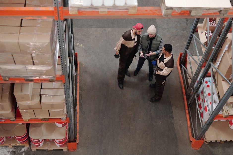 Logistics coordinator organizing shipment with paperwork