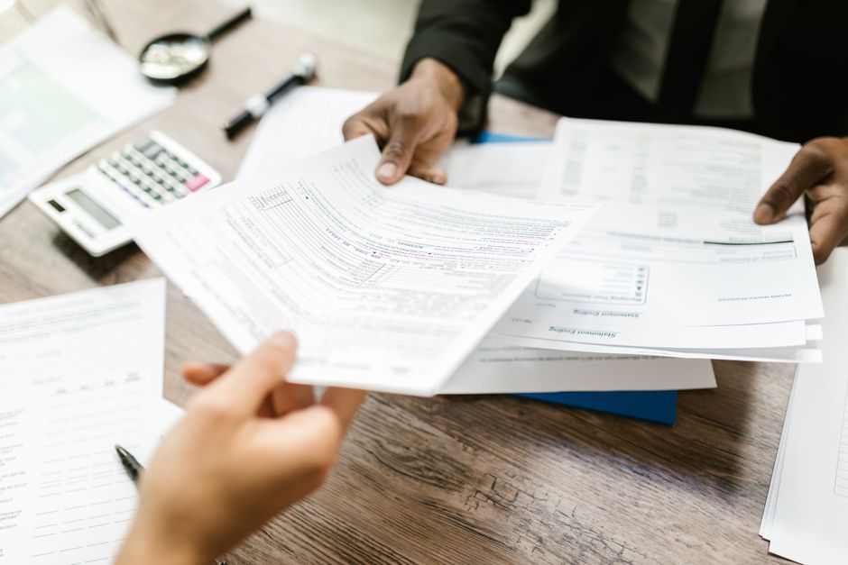 Reviewing startup equity documents in an office setting