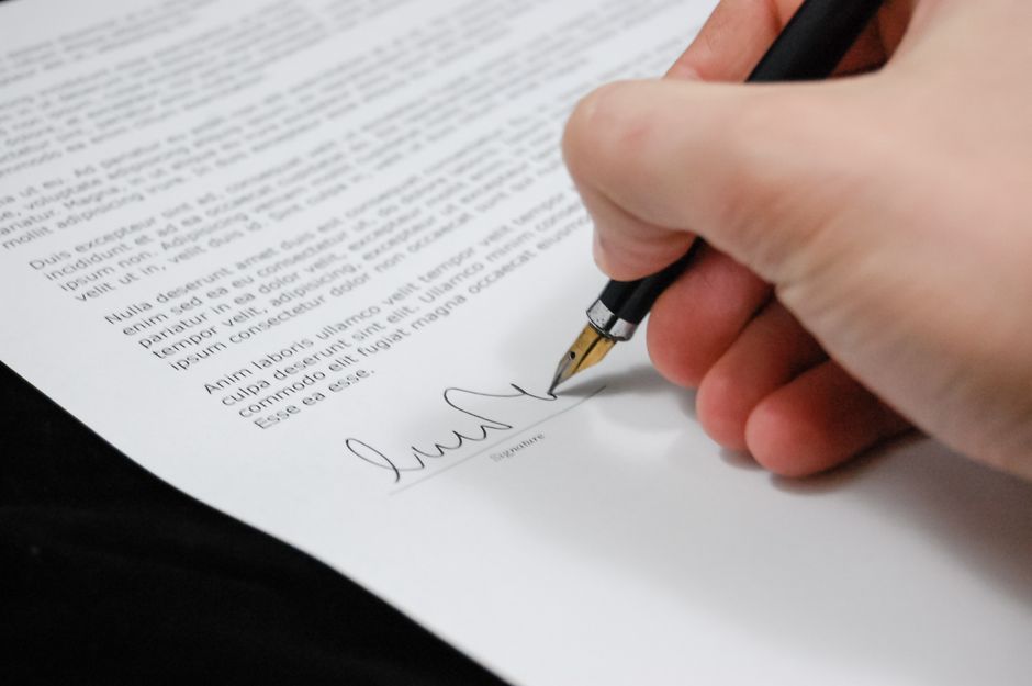 Power of attorney legal signing, senior hands