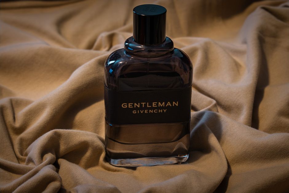 Elegant men's cologne bottles on a display.