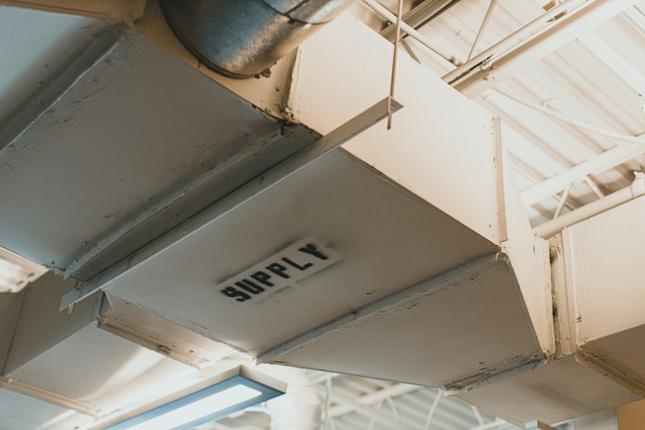 Ventilation ducts and residential HVAC system in attic