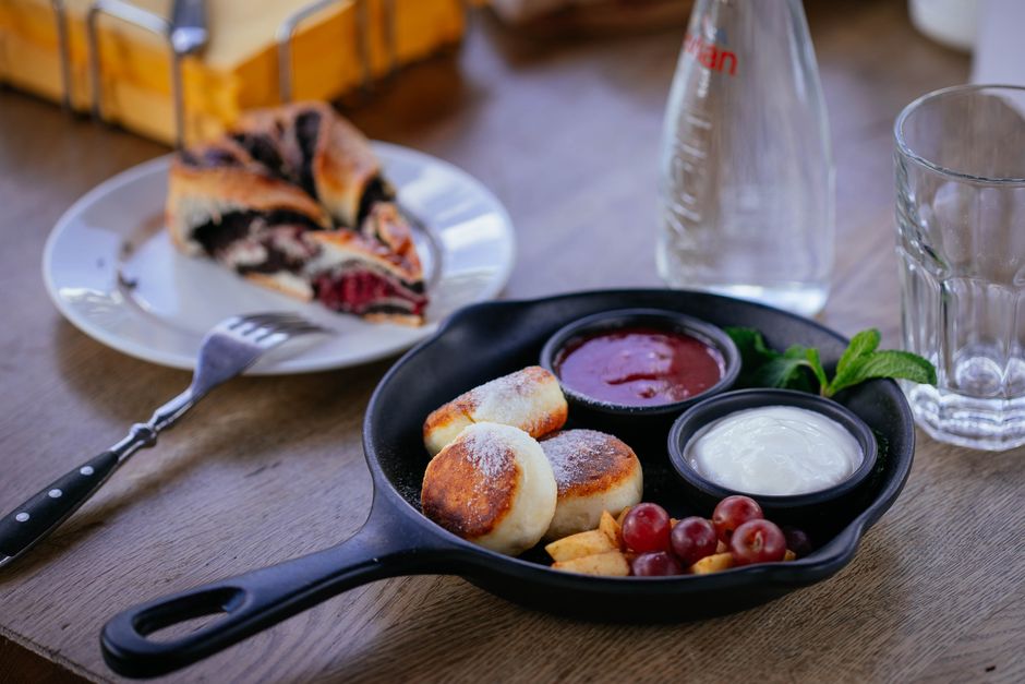 Traditional Danish aebleskiver pancakes served with homemade jam
