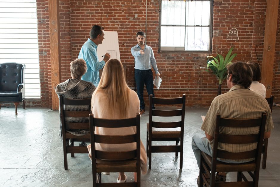 Corporate training session with facilitator and participants