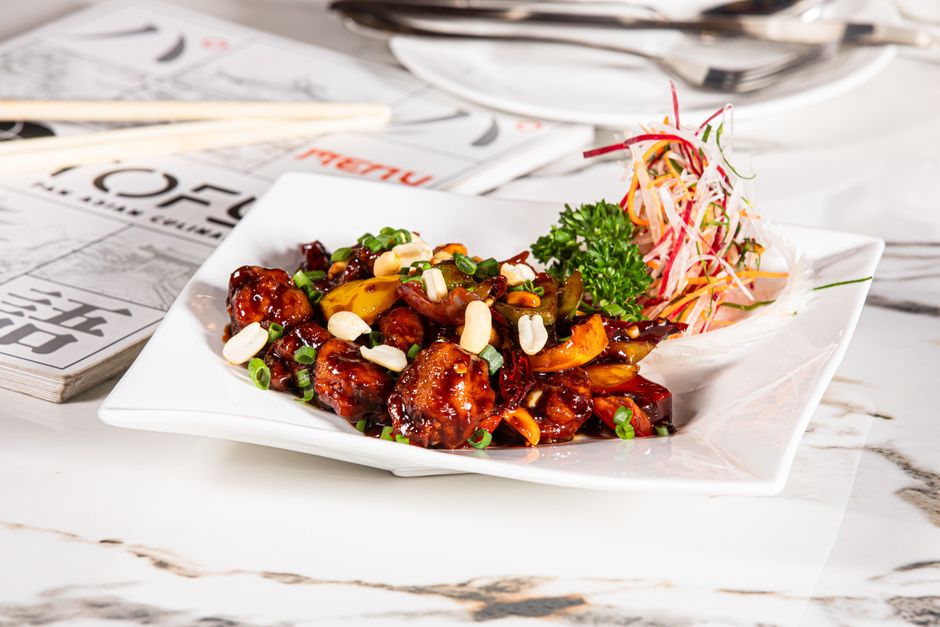 Kung Pao Chicken served in a restaurant setting