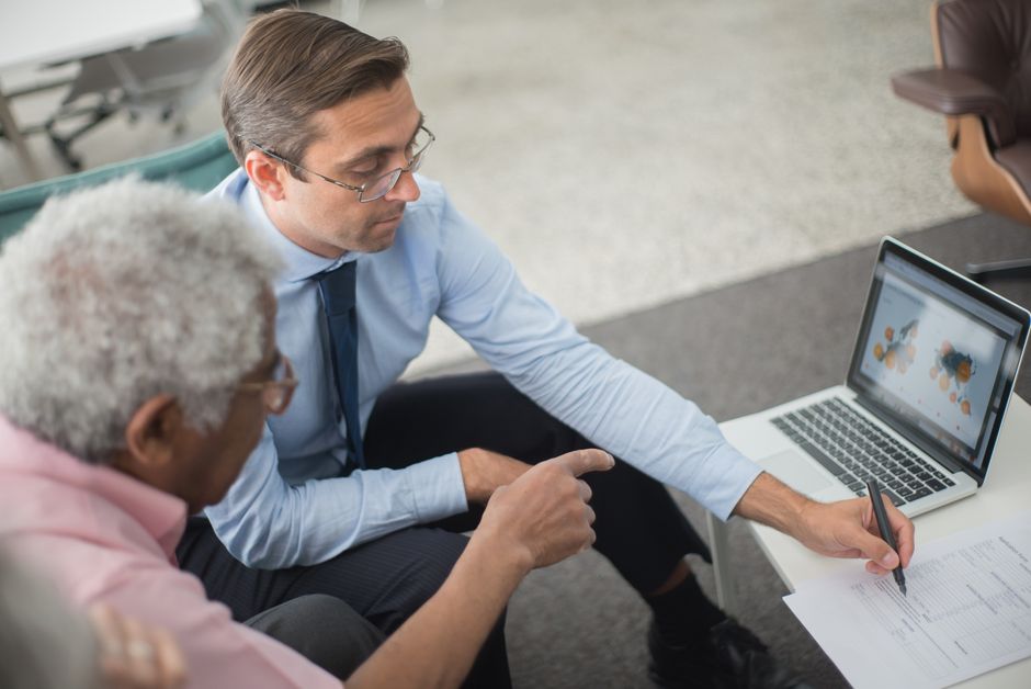 Business owner discussing commercial insurance options with agent
