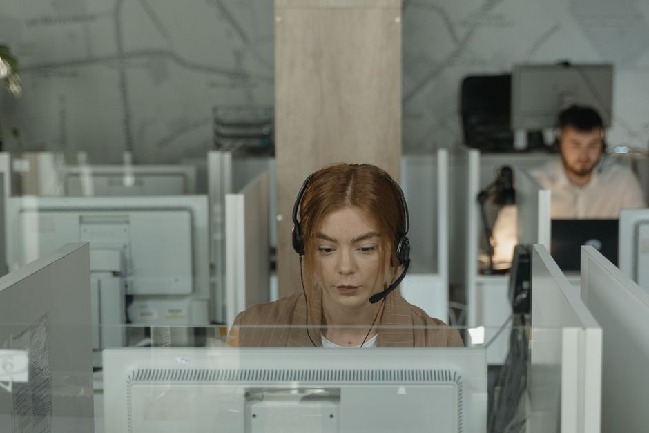 Technical support representative assisting a client online