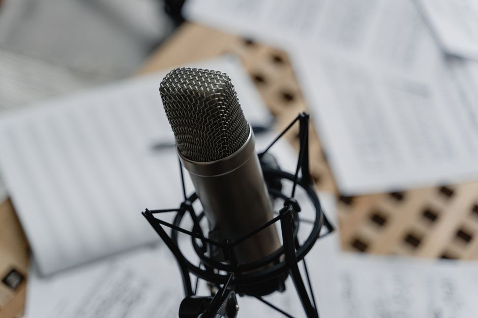 Sheet music and a microphone set up for sight-singing practice