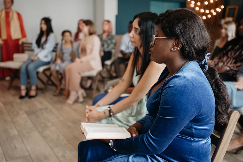 A diverse community group practicing mindfulness together